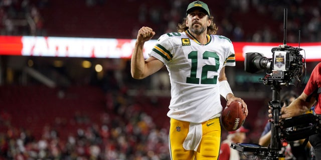 Green Bay quarterback Aaron Rodgers jogs toward the locker room after the Packers defeated the San Francisco 49ers 30-28 on Sept. 26, 2021, at Levi's Stadium in Santa Clara, California.