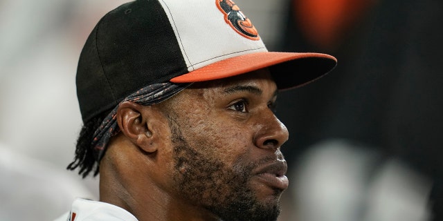 Baltimore Orioles center fielder Cedric Mullins looks on from the dugout after robbing a two-run home run off New York Yankees' Gary Sanchez during the second inning of a baseball game, Wednesday, Sept. 15, 2021, in Baltimore. (AP Photo/Julio Cortez)