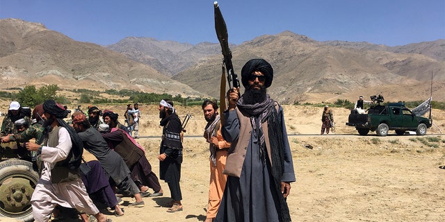 Taliban soldiers stand guard in Panjshir province in northeastern Afghanistan.