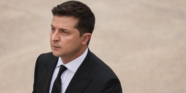 Ukrainian President Volodymyr Zelensky walks to the Tomb of the Unknown Soldier on September 1, 2021, in Arlington, Virginia. 