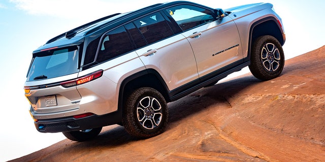 The Grand Cherokee Trailhawk 4xe's air suspension provides up to 10.9 inches of ground clearance.