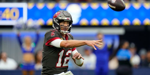 Tampa Bay Buccaneers quarterback Tom Brady throws against the Los Angeles Rams during the first half of an NFL football game Sunday, Sept. 26, 2021, in Inglewood, Calif.