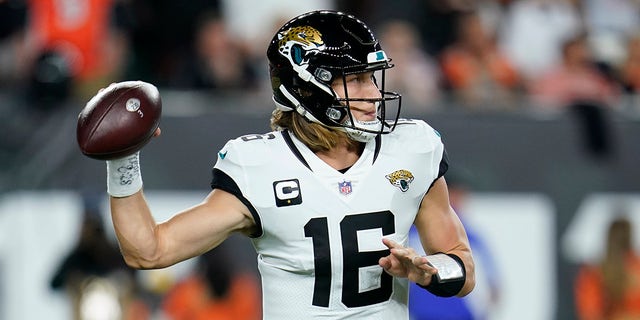 Jacksonville Jaguars fullback Trevor Lawrence (16) throws during the first half of an NFL football game against the Cincinnati Bengals, Thursday, September 30, 2021, in Cincinnati.