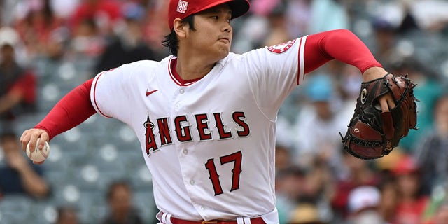 Los Angeles Angels pitcher Shohei Ohtani throws to home plate during the first inning of a baseball game against the Seattle Mariners, Sunday, Sept. 26, 2021, in Anaheim, Calif.
