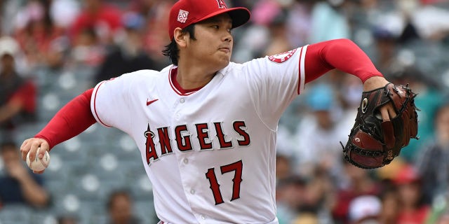 Los Angeles Angels pitcher Shohei Ohtani throws to home plate during the first inning of a baseball game against the Seattle Mariners, Sunday, Sept. 26, 2021, in Anaheim, Calif.