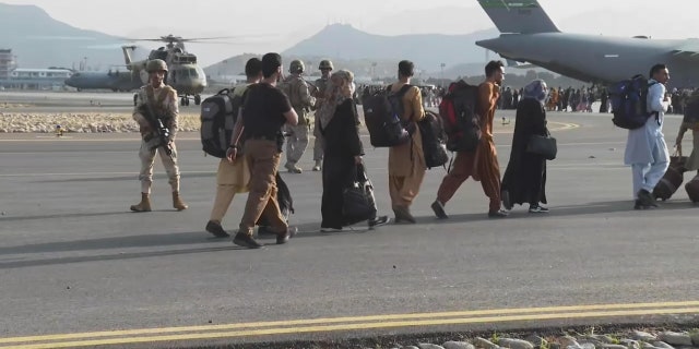 Refugees flee Afghanistan on August 22, 2021. (Fox News)