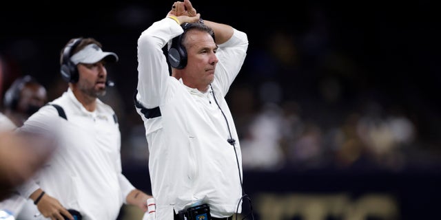 Jacksonville Jaguars head coach Urban Meyer reacts to a turnover in the second half of an NFL preseason football game against the New Orleans Saints in New Orleans, Monday, Aug. 23, 2021. (AP Photo/Brett Duke)