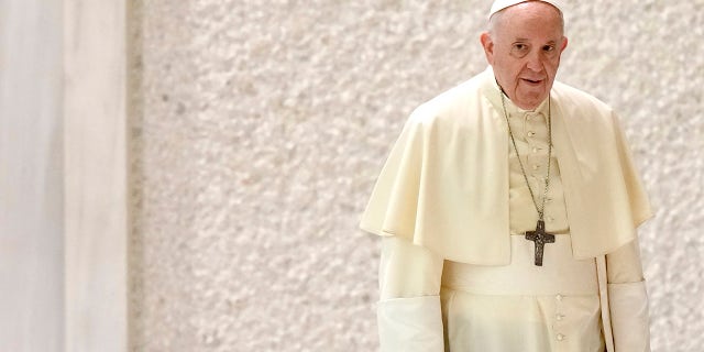 Pope Francis arrives for his weekly general audience in the Paul VI hall, at the Vatican, Wednesday, Sept. 1, 2021. (AP Photo/Andrew Medichini)