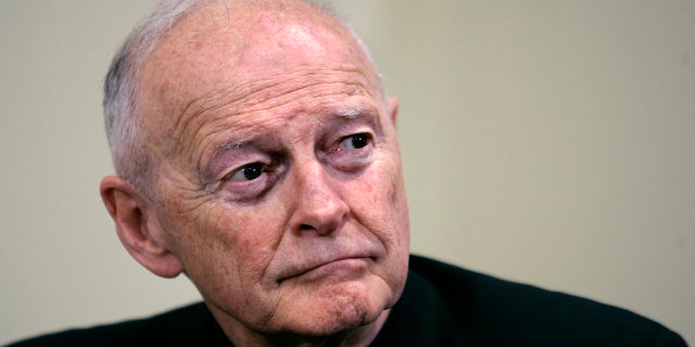 FILE — In this May 16, 2006 file photo former Washington Archbishop, Cardinal Theodore McCarrick pauses during a press conference in Washington. McCarrick is due in court to face charges that he sexually assaulted a 16-year-old boy during a wedding reception in Massachusetts nearly 50 years ago. The 91-year-old McCarrick is scheduled to be arraigned in suburban Boston's Dedham District Court Friday, Sept. 3, more than a month after he was charged. (AP Photo/J. Scott Applewhite, File)