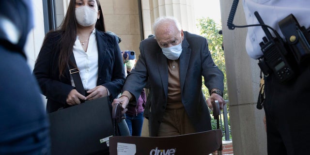 Former Cardinal Theodore McCarrick arrives at Dedham District Court, Friday, Sept. 3, 2021, in Dedham, Mass.  McCarrick, the once-powerful American prelate who was expelled from the priesthood for sexual abuse, pleaded not guilty Friday to sexually assaulting a 16-year-old boy during a wedding reception in Massachusetts nearly 50 years ago.  (AP Photo/Michael Dwyer)