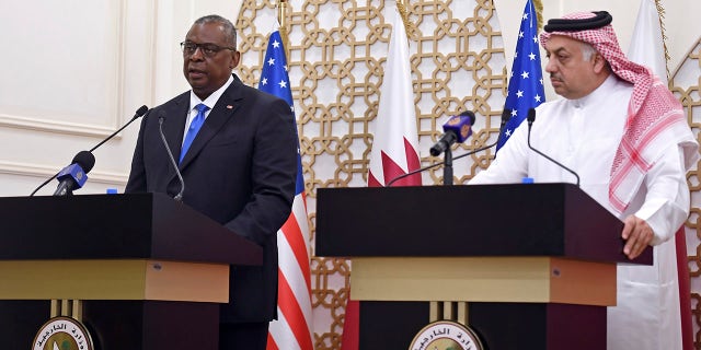 US Secretary of Defense Lloyd Austin speaks during a joint press conference with US Secretary of State Antony Blinken, Qatari Deputy Prime Minister and Foreign Minister Mohammed bin Abdulrahman al-Thani, and Qatari Defense Minister Khalid Bin Mohammed Al-Attiyah,  right, at the Ministry of Foreign Affairs in Doha, Qatar, Tuesday, Sept. 7, 2021. (Olivier Douliery/Pool Photo via AP)