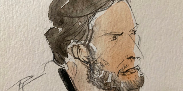 This courtroom sketch shows key defendant Salah Abdeslam, in the special courtroom built for the 2015 attacks trial, Wednesday, Sept. 8, 2021 in Paris.