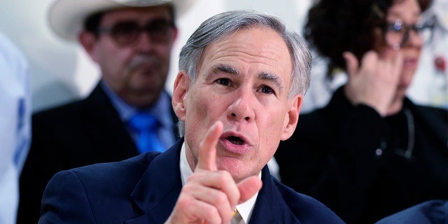 FILE - In this March 16, 2020, file photo, Texas Gov. Greg Abbott speaks during a news conference in San Antonio. 