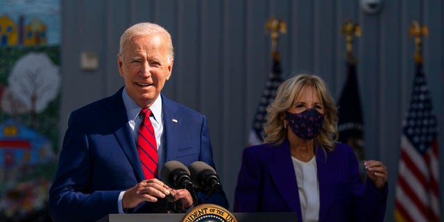 President Joe Biden, with first lady Jill Biden, speaks during a visit at Brookland Middle School in northeast Washington, Sept. 10, 2021. (Associated Press)