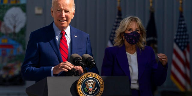 President Joe Biden, with first lady Jill Biden, speaks during a visit at Brookland Middle School in northeast Washington, Sept. 10, 2021. (Associated Press)