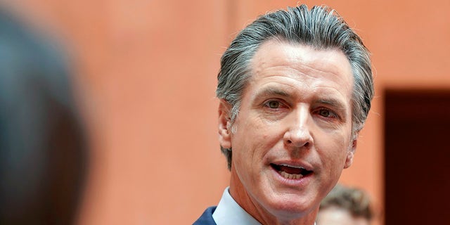 California Gov. Gavin Newsom responds to a question while meeting with reporters after casting his recall ballot at a voting center in Sacramento, Calif. (AP Photo/Rich Pedroncelli, File)