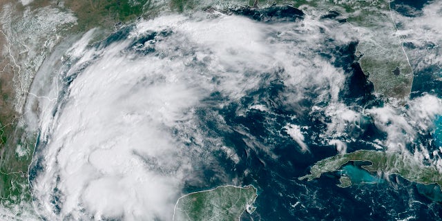 This satellite image provided by NOAA shows Tropical Storm Nicholas in the Gulf of Mexico on Sunday, Sept. 12, 2021. (NOAA via AP)