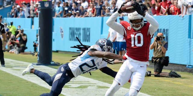 Arizona Cardinals wide receiver DeAndre Hopkins catches a touchdown pass against the Titans, Sept. 12, 2021, in Nashville, Tennessee.