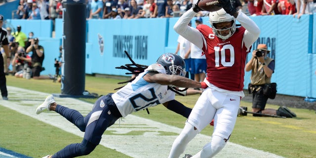 Arizona Cardinals wide receiver DeAndre Hopkins catches a touchdown pass against the Titans, Sept. 12, 2021, in Nashville, Tennessee.