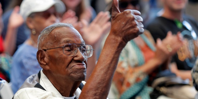 In this Sept. 12, 2019 ,file photo, World War II veteran Lawrence Brooks celebrates his 110th birthday at the National World War II Museum in New Orleans.