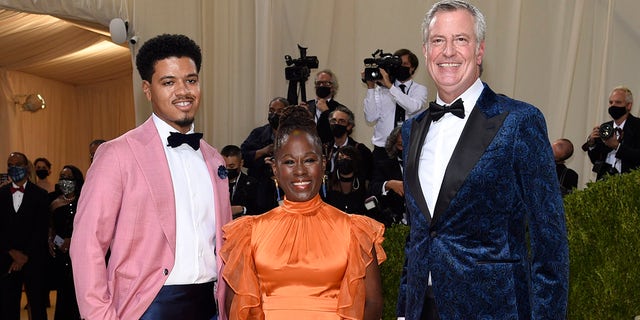 Dante de Blasio, from left, Chirlane McCray and Bill de Blasio attend The Metropolitan Museum of Art's Costume Institute benefit gala celebrating the opening of the "In America: A Lexicon of Fashion" exhibition on Monday, Sept. 13, 2021, in New York. (Photo by Evan Agostini/Invision/AP)