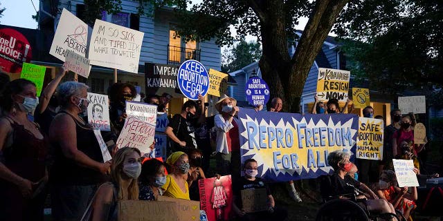 Protesters outside the home of Supreme Court Justice Brett Kavanaugh on Sept. 13 in Chevy Chase, Md.