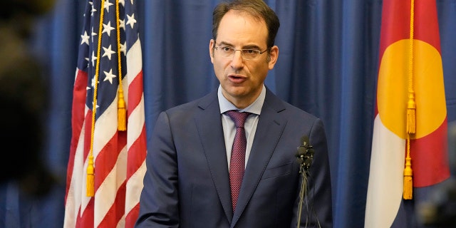 In this Sept. 1, 2021, file photo, Colorado Attorney General Phil Weiser talks about a grand jury investigation into the death of Elijah McClain, a Black man who was put in a chokehold by police and injected with a powerful sedative two years ago, during a news conference in Denver.