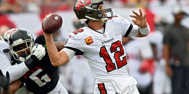 Tampa Bay Buccaneers quarterback Tom Brady ( 12 ) fires a pass against the Atlanta Falcons during the first half of an NFL football game Sunday, Sept. 19, 2021, in Tampa, Fla.