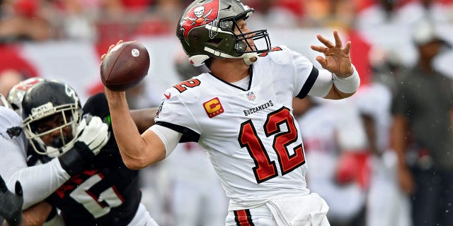 Tampa Bay Buccaneers quarterback Tom Brady (12) fires a pass against the Atlanta Falcons during the first half of an NFL football game Sunday, Sept. 19, 2021, in Tampa, Fla.