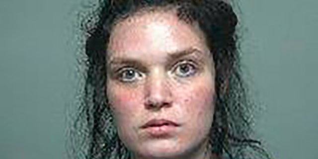 This undated photo provided by the Iosco County Sheriff's Office in Tawas City, Mich. shows Justine Johnson. Authorities have charged Johnson with murder days after her 3-year-old daughter's body was found with multiple stab wounds inside a garbage bag. Justine Johnson was arraigned Monday, Sept. 20, 2021, in 81st District Court in Tawas City, on one count each of felony murder and first-degree child abuse. (Iosco County Sheriff's Office via AP)