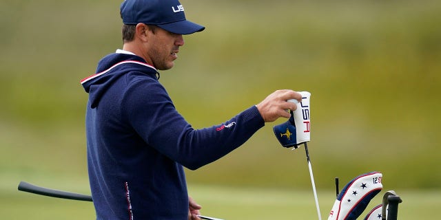 Team USA's Brooks Koepka gets a club on the 10th hole during a practice day at the Ryder Cup at the Whistling Straits Golf Course Wednesday, Septiembre. 22, 2021, in Sheboygan, Wis.
