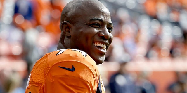 Denver Broncos outside linebacker DeMarcus Ware (94) smiling prior to an NFL football game against the San Diego Chargers in Denver, Oct. 30, 2016.