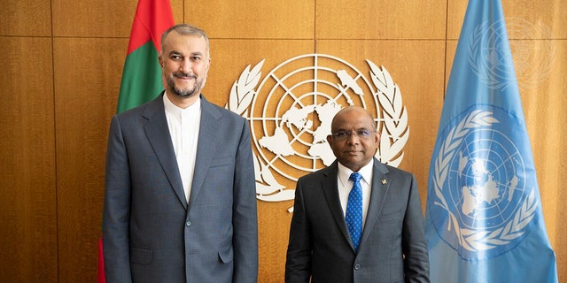 In this photo provided by the United Nations, United Nations General Assembly President Abdulla Shahid of Maldives, right, meets with Iran's Foreign Minister Hossein Amir Abdollahian, during 76th session of the United Nations General Assembly, Thursday, Sept. 23, 2021, at UN headquarters. 