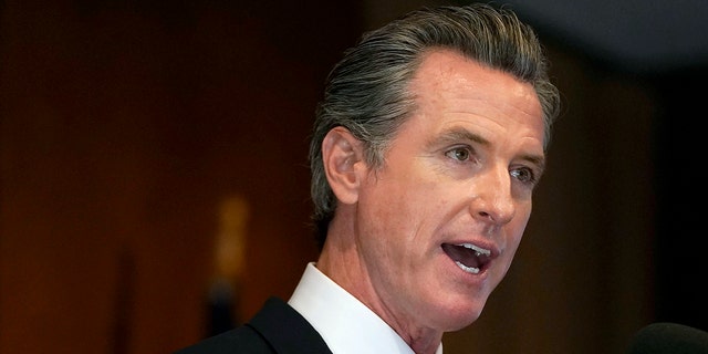 California Gov. Gavin Newsom speaks in San Francisco. The liberal state's proposed overhaul of its math curriculum has alarmed subject experts.