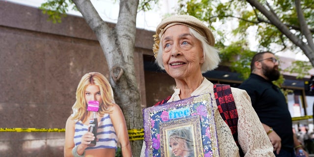 Britney Spears supporter Mona Montgomery of Glendale, Calif., demonstrates outside the Stanley Mosk Courthouse, Wednesday, Sept. 29, 2021, in Los Angeles.