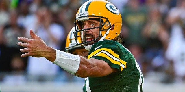 Sep 12, 2021; Jacksonville, Florida, USA; Green Bay Packers quarterback Aaron Rodgers (12) directs teammates during the second half against the New Orleans Saints at TIAA Bank Field. Mandatory Credit: Tommy Gilligan-USA TODAY Sports