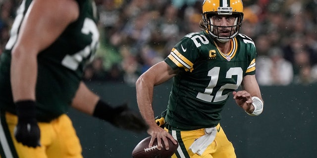 Aaron Rodgers of the Green Bay Packers struggles during the second half of an NFL football game against the Detroit Lions on Monday, September 20, 2021, in Green Bay, Wisconsin. 