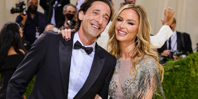 Adrien Brody and Georgina Chapman attend The 2021 Met Gala Celebrating In America: A Lexicon Of Fashion at Metropolitan Museum of Art on September 13, 2021 in New York City. 