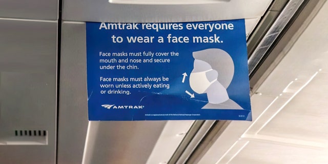 Amtrak requires all passengers to wear face coverings and masks throughout entirety of trip, per federal mandate. 