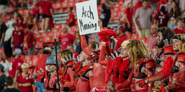 Sep 18, 2021; Athens, Georgia, USA; Georgia Bulldogs fans help recruit high school player Arch Manning after Georgia defeated the South Carolina Gamecocks at Sanford Stadium.