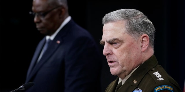 Joint Chiefs of Staff Gen. Mark Milley, right, answers a question during a briefing with Secretary of Defense Lloyd Austin, left, at the Pentagon in Washington, Wednesday, Sept. 1, 2021, about the end of the war in Afghanistan.