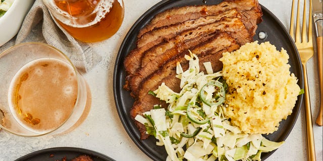 The Dry-Rubbed Barbecue Brisket with Zesty Cabbage Slaw from Cassy Joy Garcia’s new cookbook "Cook Once Dinner Fix: Quick and Exciting Ways to Transform Tonight's Dinner into Tomorrow's Feast" is pictured.