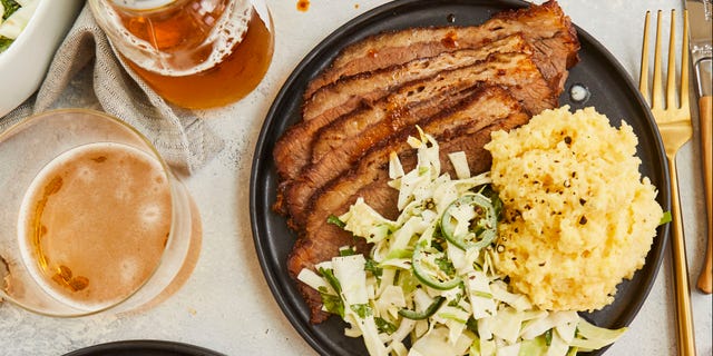 The Dry-Rubbed Barbecue Brisket with Zesty Cabbage Slaw from Cassy Joy Garcia’s new cookbook "Cook Once Dinner Fix: Quick and Exciting Ways to Transform Tonight's Dinner into Tomorrow's Feast" is pictured.