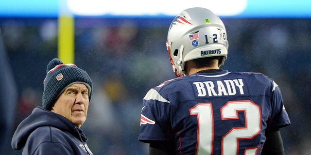 FOXBOROUGH, MASSACHUSETTS - NOVEMBER 24: Head coach Bill Belichick of the New England Patriots talks with Tom Brady #12 before the game against the Dallas Cowboys at Gillette Stadium on November 24, 2019 in Foxborough, Massachusetts. (Photo by Kathryn Riley/Getty Images) 