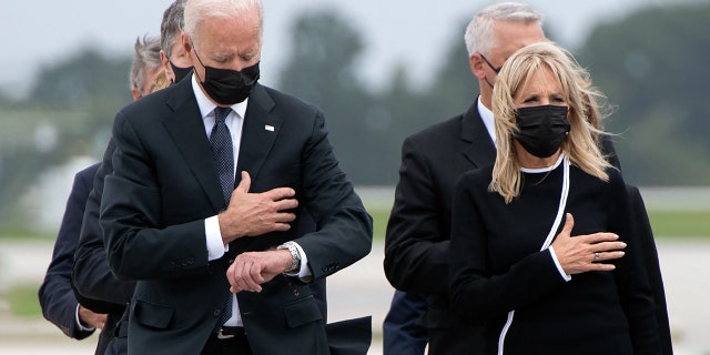 Biden checks watch