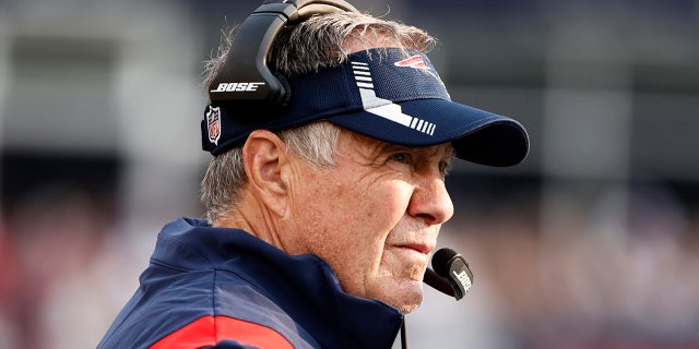 New England Patriots head coach Bill Belichick watches play during the first half of an NFL football game against the Miami Dolphins, Sunday, Sept. 12, 2021, in Foxborough, Massachusetts.