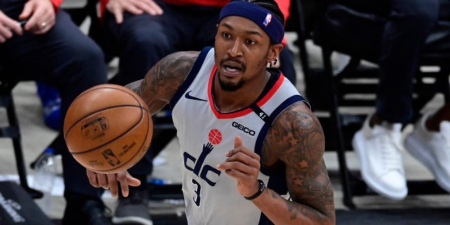 Washington Wizards goalie Bradley Beal dribbles across the field in Game 4 against the Philadelphia 76ers in the 2021 NBA Playoff first round at Capital One Arena on May 31, 2021. 