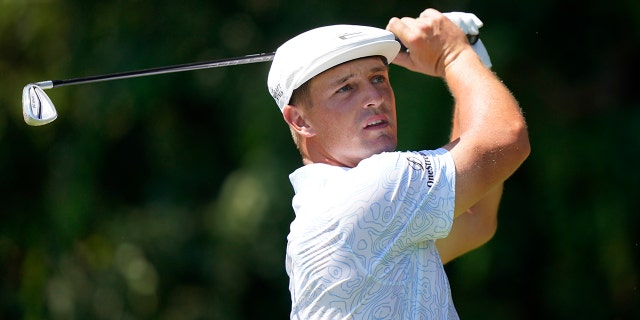 Bryson DeChambeau hits from the second tee during the third round of the Tour Championship golf tournament Saturday, Sept. 4, 2021, at East Lake Golf Club in Atlanta.