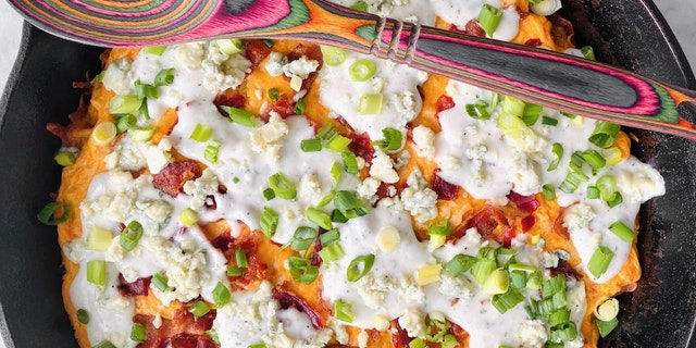The recipe combines the tangy taste of buffalo chicken dip with crispy tater tots, two "favorite football party foods," according to Morgan’s blog post.