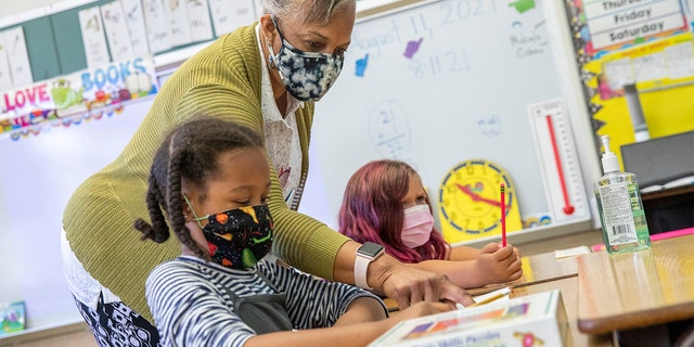 In this Aug. 11, 2021, file photo, Joy Harrison instructs her second-graders at Carl B. Munck Elementary School, in Oakland, Calif. (Santiago Mejia/San Francisco Chronicle via AP, Pool, File)